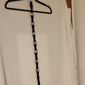 Zoooz Leather black belt featuring seven silver floral accents 29-33" Waist